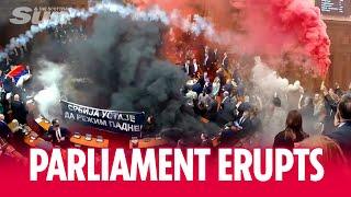 PARLIAMENT ERUPTS: Smoke grenades, tear gas, clashes as protests rock Serbia