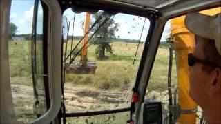 Long Reach Excavator Loading Mud