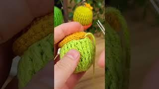 It's so easy to knit a cactus keychain, a great gift idea for your cactus-loving friend.