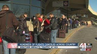 Travelers in long lines for post-holiday travel at KCI