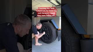 Checking Tesla Cybertruck for loose lug nuts