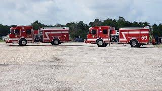 5 new fire trucks sitting unused