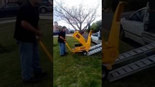 JB's Gardens & Removals Mulcher unloading and loading.