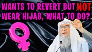 If she wants to revert to Islam but does not want to do hijab, can she still become Muslim???