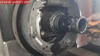 Heli forklift changing brake lining.