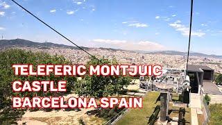 Riding Teleferic *cable car*  Montjuic Castle down Barcelona Spain