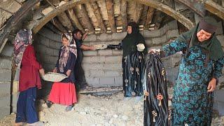 Grandma's joy in her new dress: She repairs the roof of the cave