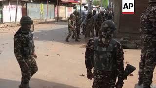 Kashmiri protesters and Indian security forces trade stones and tear gas