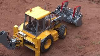 Backhoe loader, MB SK semi, JD forwarder RC live action at the construction site Part 33