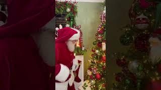  Watch as Santa thoughtfully admires