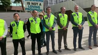 Jehovah’s Witnesses form a CULTY barricade at JW Melbourne protest