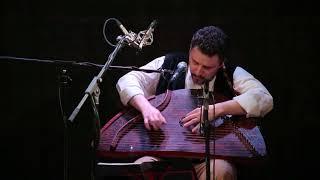 Virtuoso playing the helmet-shaped gusli Kirill Bogomolov