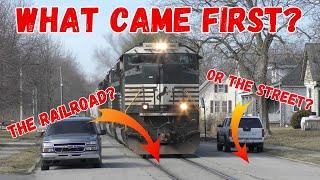 What came first???  The railroad or the Street??? Fast moving trains take over the street in town