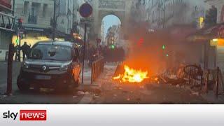 Protests break out in Paris after deadly triple shooting