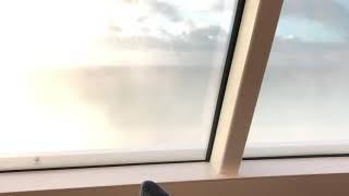 Huge wave hits the 15th floor Observation Lounge on the NCL Encore