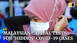 Malaysia sets up Covid-19 test zones in the capital to hunt for ‘hidden’ coronavirus cases