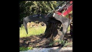 Grapple attachment for tractors makes cleaning up a must-have. #grapple #tractor #attachment