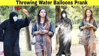 Throwing Ice Water Balloons at Peoples Prank | @HitPranks