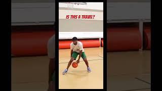 If you have BASKETBALL IQ answer if this move is a travel or not?