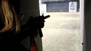Erika shoots an MP5K-PDW-SD (Full Auto Short Burst)