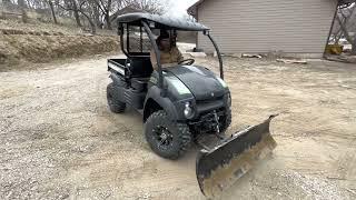 Mule 610 XC Pushing Dirt with 60'' WARN ProVantage Plow.