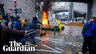 Protesting farmers light fires and clash with police at European parliament