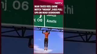 Man Takes Reel Game Notch "Higher", Does Pull Ups On Road Signboard