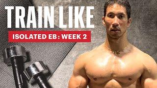 MH’s Fitness Director's Water Jug Quarantine Workout | Train Like Isolated Eb | Men's Health