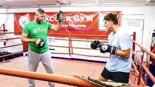 Boxer FATHER VS SON: James Branch Sr takes his lad on the pads