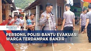 Personil Polresta Gorontalo Kota Bantu Evakuasi Barang Milik Warga Terdampak Banjir