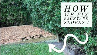 QUICK & EASY WAY TO LEVEL ANY SLOPED BACKYARD! | DIY RETAINING WALL