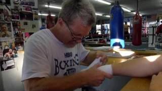 Boxing Trainer Freddie Roach wraps Nicholas Robinson's hands (Boxing)