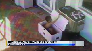 Boy becomes trapped in a cooler