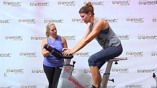 Good riding posture on a Spin® bike. Improving upper body cycling position.