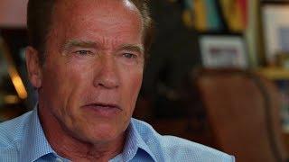 Arnold Schwarzenegger speaks with Guenther Ziesel