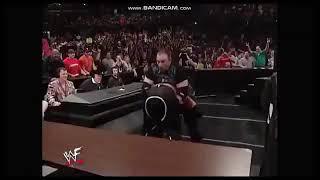 Bubba Ray Dudley powerbombs Stevie Richards through table