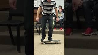 Teacher lands sick skate trick in class