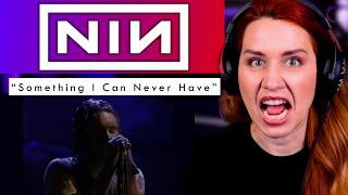 This Nine Inch Nails Woodstock performance is chilling.  ANALYSIS of "Something I Can Never Have"