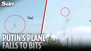 Moment Russian warplane breaks-up in mid-air as pilot frantically tries to eject
