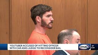 Man accused of hitting police officer with car asks judge to reconsider bail