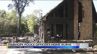 Fairhope police officer gets his family out of burning house fire in Spanish Fort