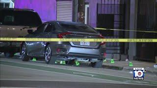 After Miami shooting, crime scene techs pepper bullet markings around car