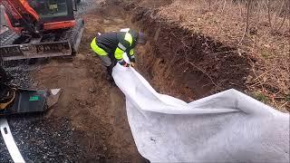 Bygging av Asak Mini støttemur med Kubota u27-4. Construction of retaining wall with Kubota u27-4.