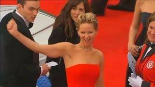 Jennifer Lawrence falls on Oscars 2014 red carpet