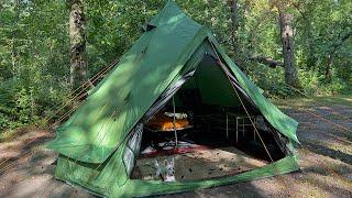 Camping In Forest With Fire Pit