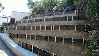 Pipe and Board + Retaining Wall Project by Alpha Structural