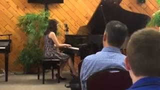 Jessica playing at the recital of Joanna Han's students