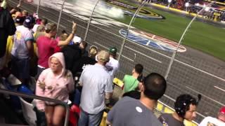 2013 Sprint All Star Race: Drunk NASCAR fan throws beer at Jimmie Johnson, gets slapped in the face.