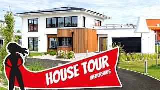 Exklusive Stadtvilla mit Keller, Dachterrasse und Aufzug von Weberhaus | House Tour | Hausbau Helden