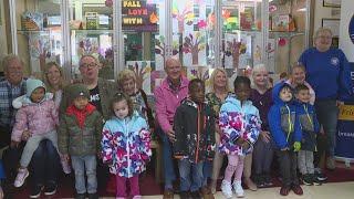 Moline Breakfast Optimist Club hands out winter gear to local children